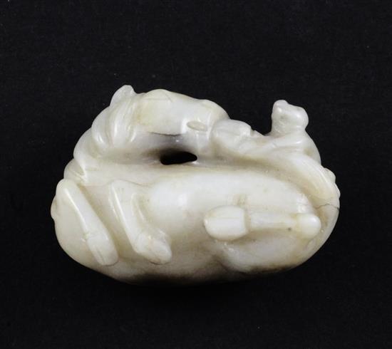 A Chinese white and black jade group of a monkey and a recumbent horse, 19th century, 4cm.